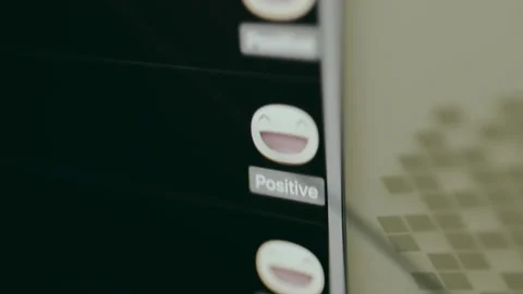 User interface displays repetitive icons with smiling faces and word Positive Stock Footage 329316609