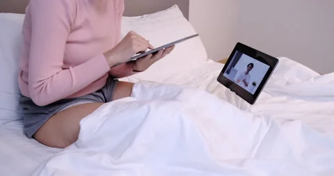 User interface remotely asian woman video conferencing with tutor Video stock 132353773