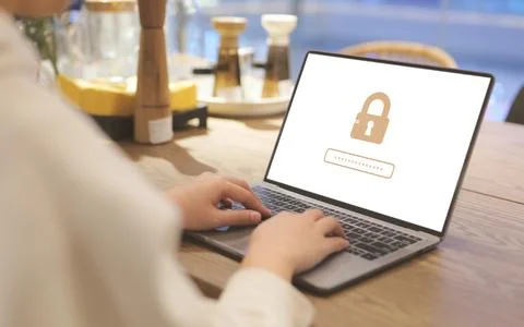 User is logging in with a username and password public. Cybersecurity. Stock Photos