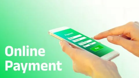 User making an online payment using a mobile device on a bright background Stock Photos