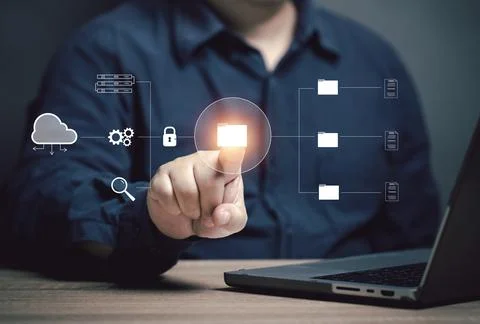 The user points to a folder at the virtual screen to work. Storing corporat.. Stock Photos