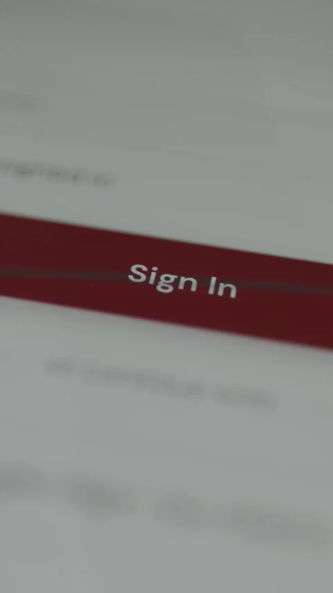 A user presses the Sign In button to log in Stock Footage 332892318