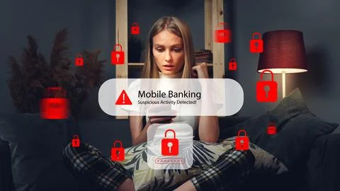 User receives scam call SMS message warning about mobile banking activity Stock Photos