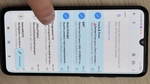 User receives too many emails on smartphone and inbox is full, remove spam on Stock Footage 230080184