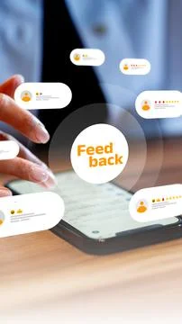 User reviews on a smartphone screen during a feedback session Stock Photos