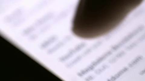 A user scrolling down their message feed on a smartphone Stock Footage 88488041