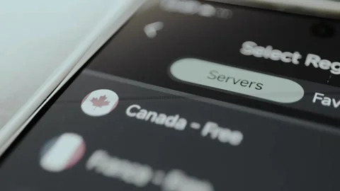 User scrolling a list of Free Servers that c an be used without cost, VPN Stock Footage 329748740