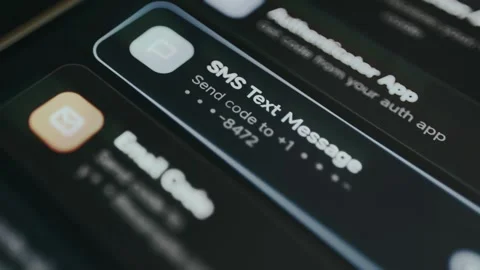 User selects SMS text message option for two-factor authentication Stock Footage 334420171