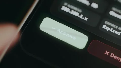 User taps the Approve button to authorize a pending action Stock Footage 334413940