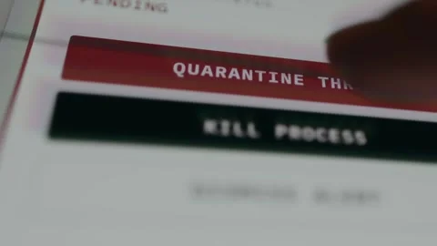 User taps the button labeled QUARANTINE THREAT to isolate a suspicious file Stock Footage 333823448