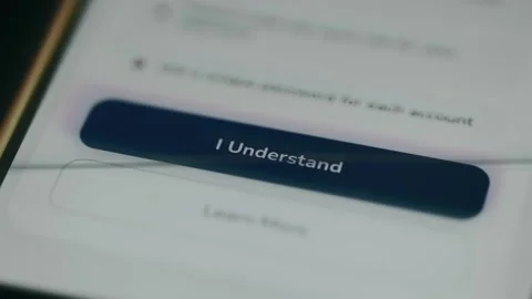 User taps the confirmation button labeled I Understand Stock Footage 334386938