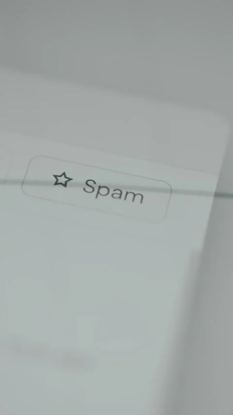 User taps the digital button labeled Spam Stock Footage 333381930
