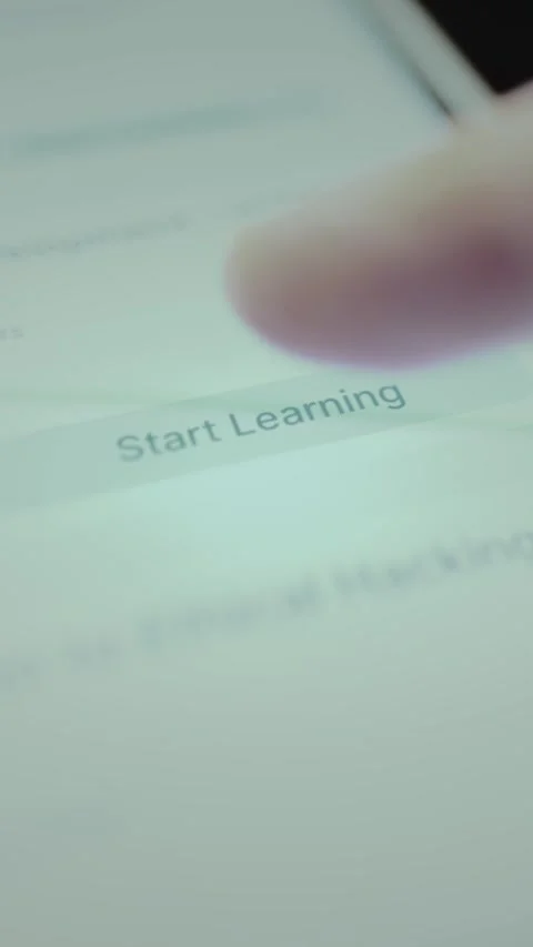 User taps the digital button Start Learning, lifelong learning concept 库存影片 328356755