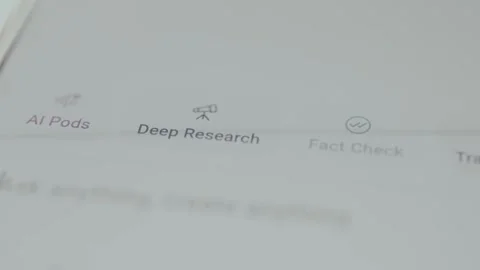 User taps the option labeled Deep Research within the interface of an AI Stock Footage 329285262