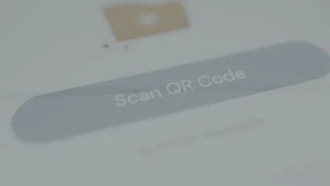 User taps the option labeled Scan QR Code Stock Footage 328817411