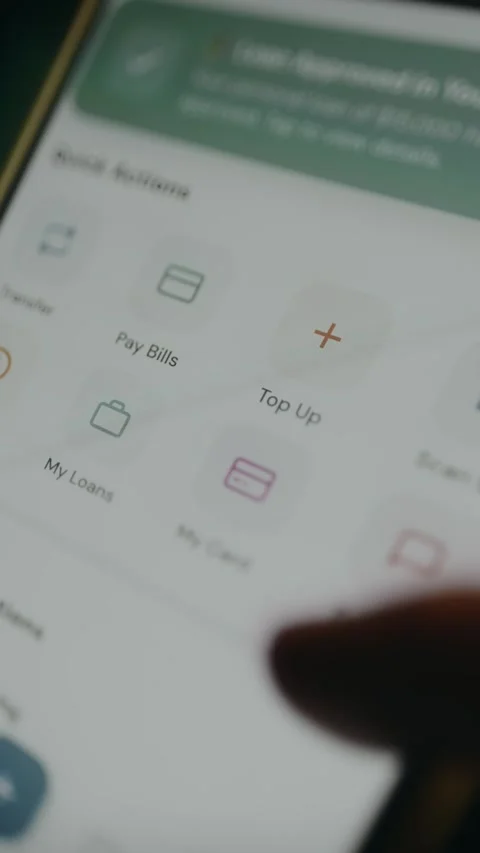 User taps the option My Card from a mobile banking application interface Stock Footage 333825050