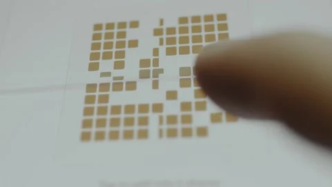 User taps the QR code to split the amount of money between 4 people Stock Footage 332498899