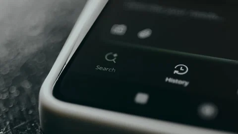 User taps the Search icon from an AI assistant app Stock Footage 329285330