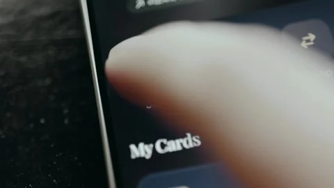 User taps the Send button for transferring digital assets from banking app Stock Footage 332499221