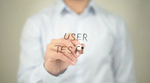 User Testing, Man Writing on Transparent Screen Stock Footage 62878054