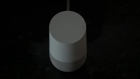 User Turns Volume Down on a Smart Home Speaker Voice Assistant Stock-Footage 104118411