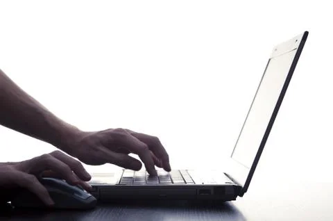 User Typing On Laptop Keyboard Foto stock