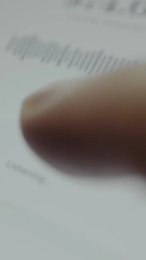 User uses Voice Pay by speaking the amount while holding mic button Stock Footage 332512097
