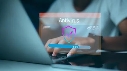User using laptop for antivirus software scanning with digital shield and l.. Stock Photos