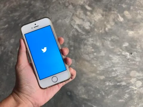 User is using twitter Stock Photos