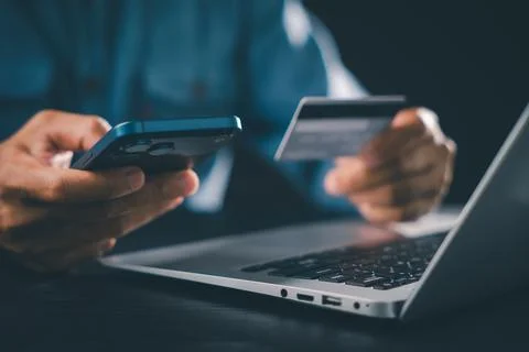 User utilizes smartphone digital display for cyber security during online s.. Stock Photos