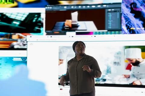 User watching videos on digital backdrop, concept of endless entertainment 库存照片