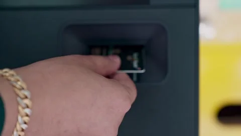 User withdraws card from ATM machine Stock Footage 265935033
