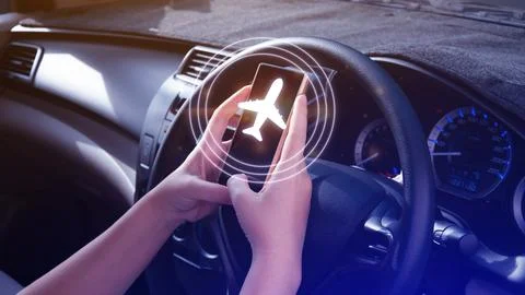 Uses touching to select flight by pressing touch screen airplane button on .. Stock Photos