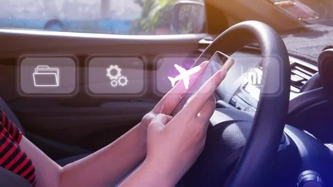 Uses touching to select flight by pressing touch screen airplane button on .. Stock Photos