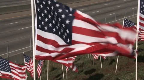 USFlagsHighwayPan Stock Footage 12737617