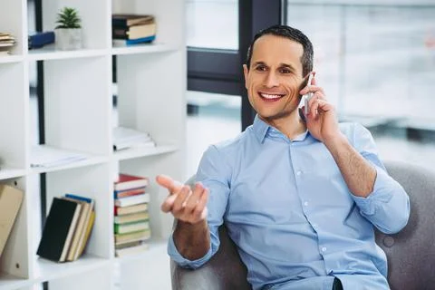 Usinessman talking on the cellphone Stock Photos
