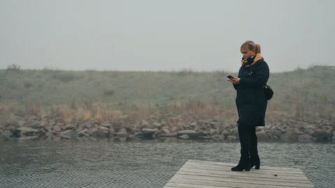 Using 5G phone for texting in rural area with poor coverage Stock Footage 122261239
