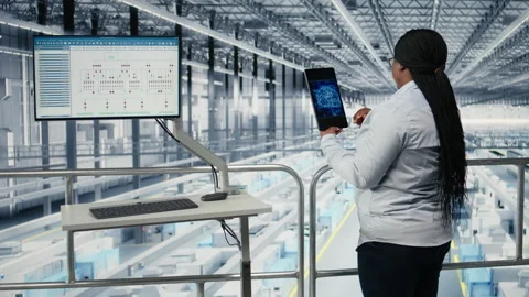 Using AI deep learning, EDA software and woman monitoring PCB smart factory Stock Footage 333380220