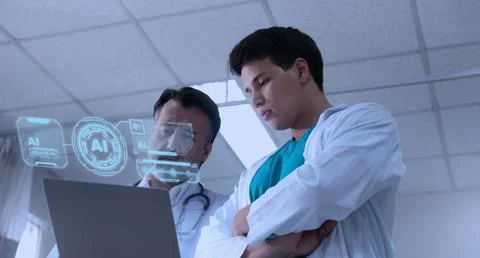Using AI. Doctors collaborating and using futuristic AI holographic interface Stock Photos