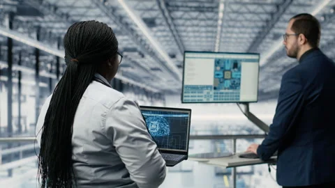 Using AI, microchip innovative technology and woman with colleague Stock Footage 333386271