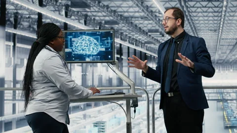 Using AI, microchips and industry 4.0 plant directors innovating production Video stock 333386549