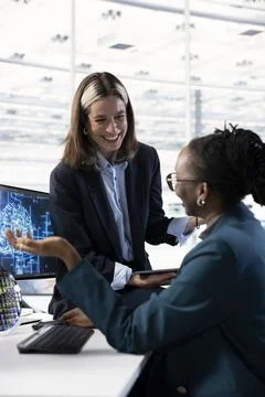 Using AI neural network, computer monitor and women Stock Photos