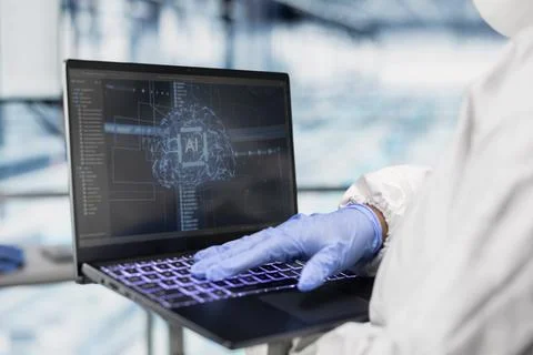 Using AI neural network, laptop close up and engineer in microchip factory Stock Photos