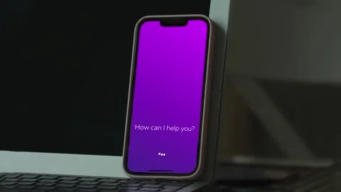 Using AI Personal Assistant App on a Smartphone in Office Over a Laptop Vidéo 266257031