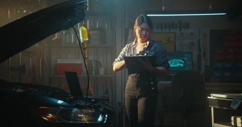 Using AI Software on Tablet, Girl Compares Real Time Readings With Standard Stock Footage 330273359