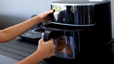 Using an Air Fryer in a Modern Kitchen Stock Footage 312204946