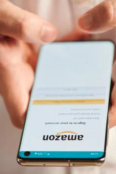 Using amazon account mobile app Stock Photos