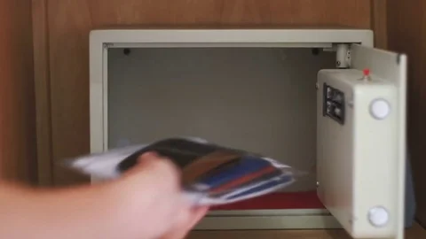 Using and Open Code Modern Safe and gets out Valuable Papers and Documents Stock Footage 73012248