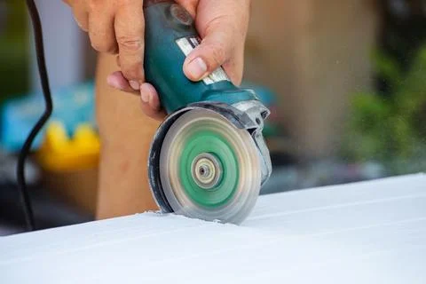Using the angle grinder Stock Photos