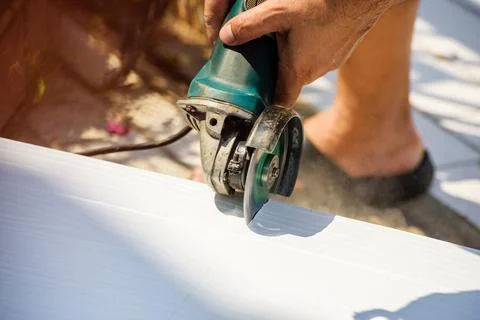 Using the angle grinder Stock Photos